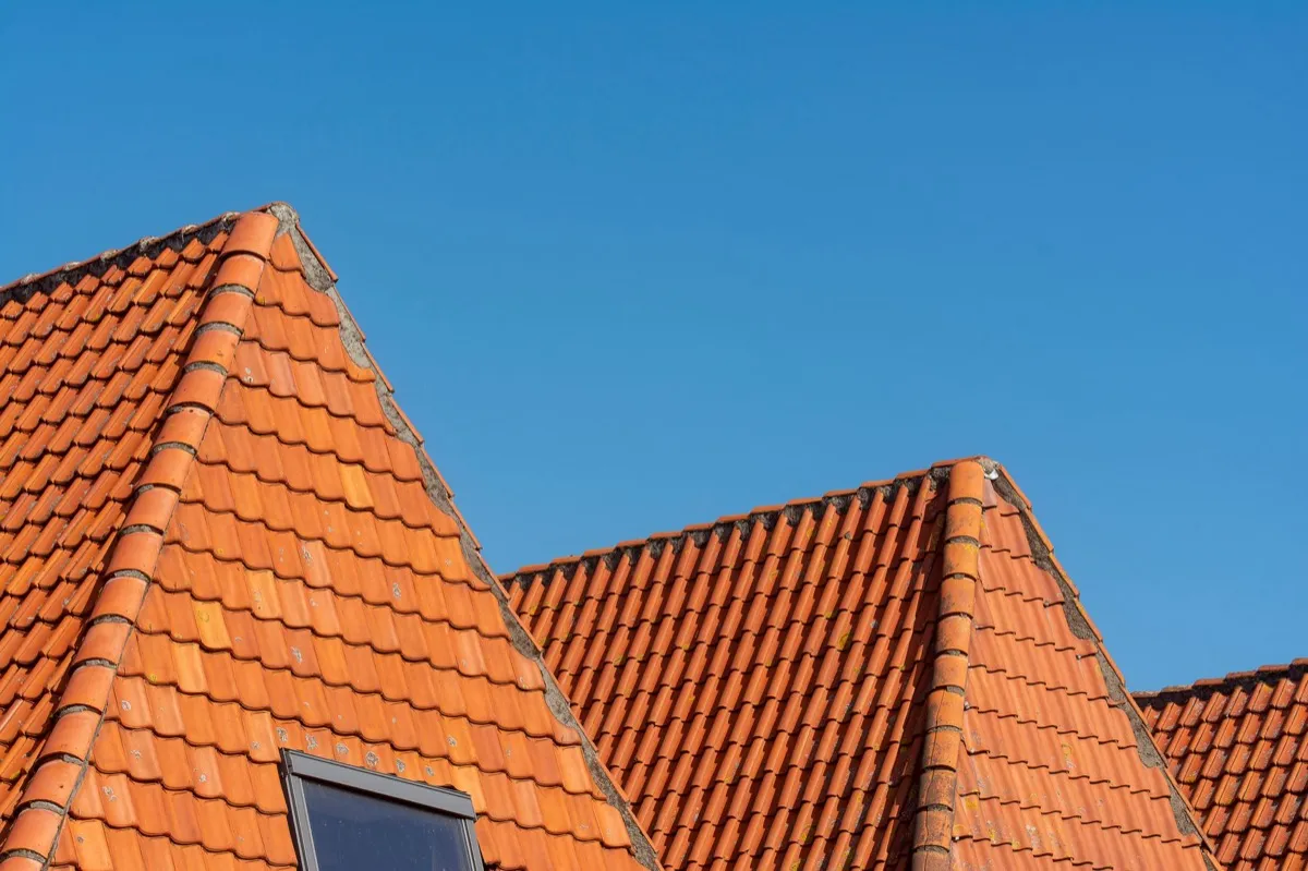 Clay barrel tile rooflines on homes in Topeka, KS
