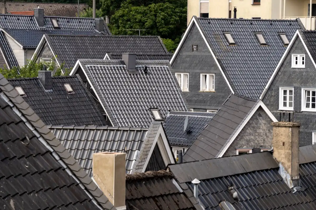 Steep roof eaves and gutter lines on houses in Topeka, KS